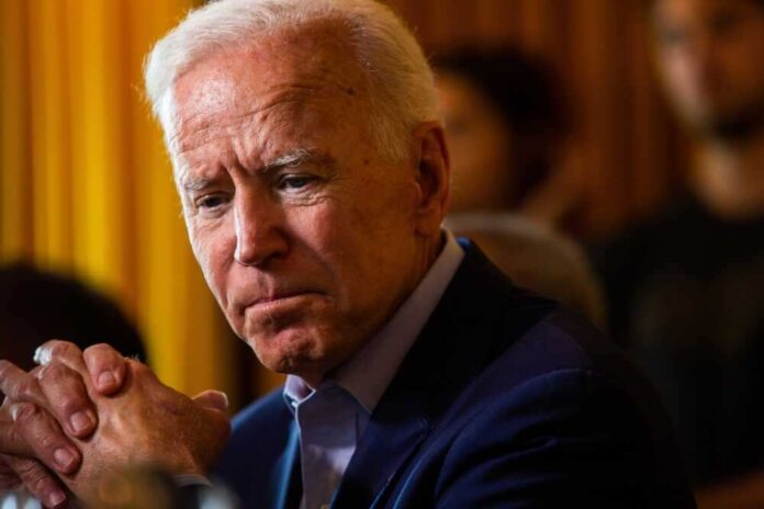 shutterstock_2474501321.jpg featured image Joe Biden solemn, thinking.