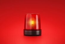 Red emergency light on red background