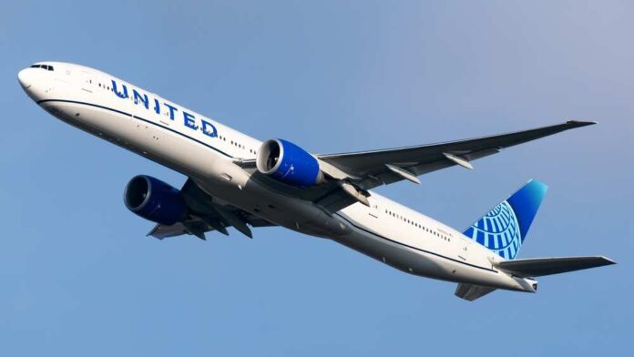 shutterstock_2446491107.jpg featured image Airplane flying in clear blue sky daytime