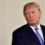 Donald Trump in suit and tie.