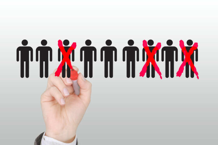 shutterstock_1688476213.jpg featured image Hand crossing out stick figures with a red marker.