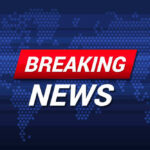 Breaking News text on world map background