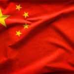 Red flag with five yellow stars, China's flag.