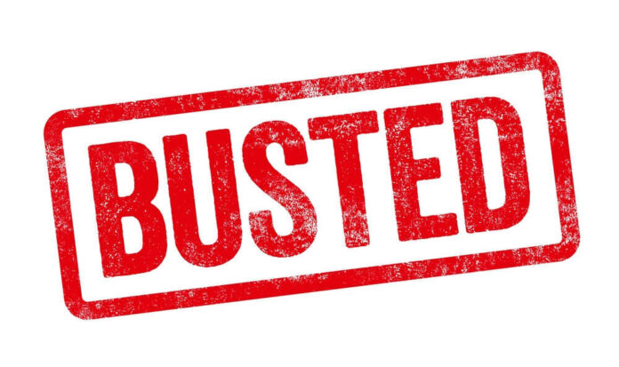 shutterstock_2145950997.jpg Red Busted stamp on white background
