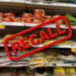 Recall notice over grocery store shelves