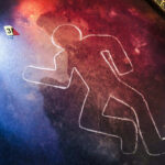 Crime scene chalk outline with numbered evidence markers
