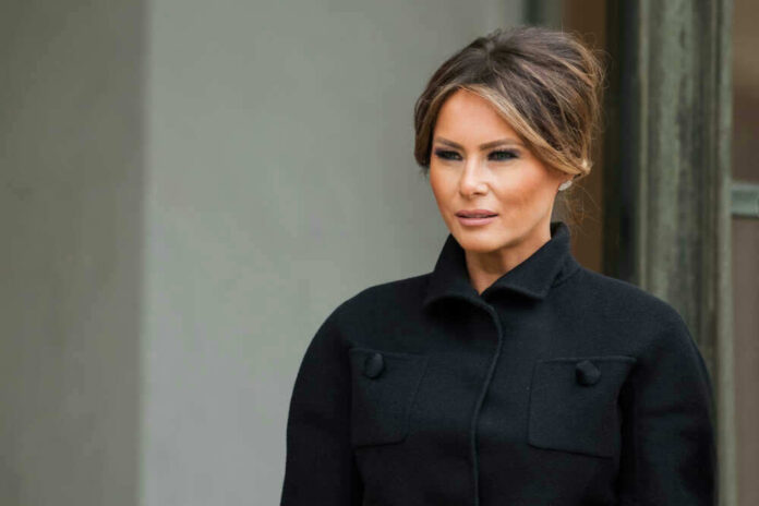 Melania Trump in black coat
