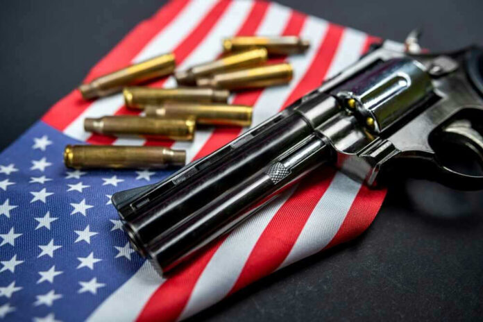 Revolver and bullets on American flag background