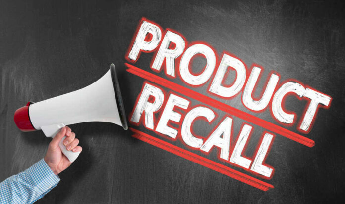 Megaphone and Product Recall text on chalkboard