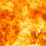 Bright orange and yellow flames burning intensely