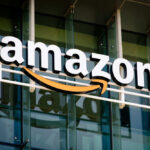Amazon’s SHOCKING Crackdown Amazon logo on a glass office building