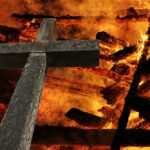 Blaze Destroys Church: Religious Liberty Under Attack (Video) Wooden cross in front of burning firewood logs