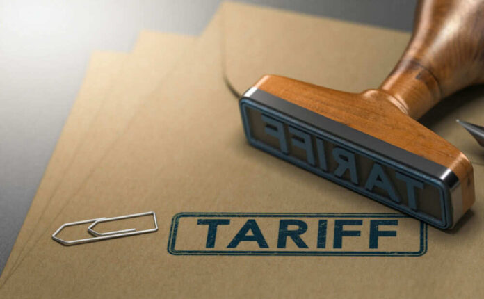 shutterstock_1129996706.jpg Folders with the word tariff stamped