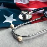 A stethoscope resting on an American flag