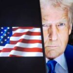 Close-up of a political figure with an American flag in the background