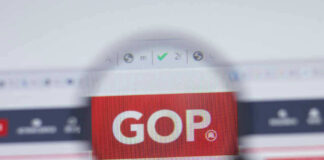 Magnifying glass focusing on GOP website logo.
