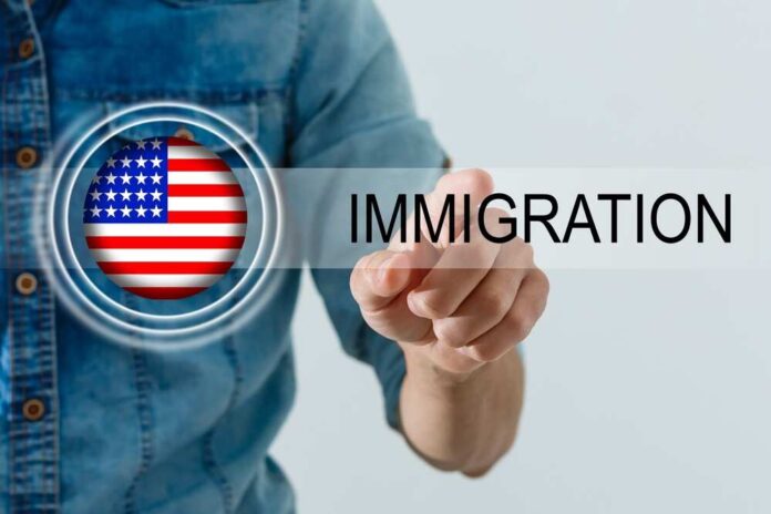 A person pointing at the word 'IMMIGRATION' with an American flag graphic