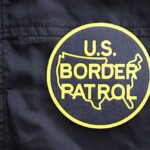 U.S. Border Patrol patch on a black jacket