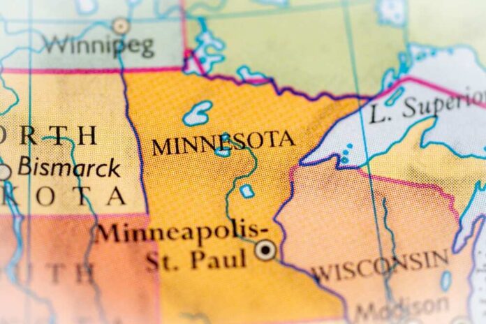 shutterstock_2576451415.jpg Close-up of a map showing Minnesota and North Dakota