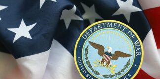 Department of War emblem on an American flag background