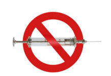 A syringe with a red prohibition sign overlay
