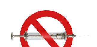 A syringe with a red prohibition sign overlay