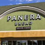 Exterior view of a Panera Bread restaurant with a drive-thru