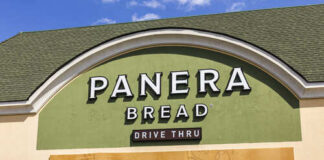 Exterior view of a Panera Bread restaurant with a drive-thru