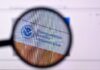 Magnifying glass focusing on the Transportation Security Administration website