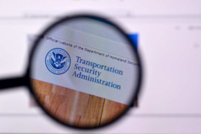 Magnifying glass focusing on the Transportation Security Administration website