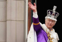 Historic First: King Charles to Address Congress! Man in royal attire and crown waving, stone background.