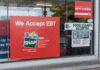 Food Stamp Crackdown Spreading Store window displays EBT and SNAP acceptance signs