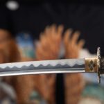Close-up of a katana blade with intricate details