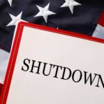 A shutdown notice placed on an American flag