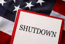 A shutdown notice placed on an American flag