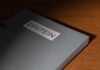 Close-up of a metallic binder labeled 'EPSTEIN'