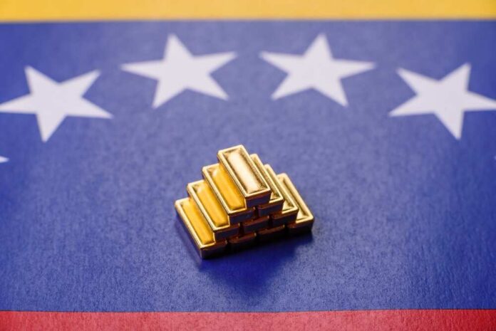 Stack of gold bars on a Venezuelan flag background