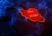 Iran War Shock Threatens Rate Cuts Digital map highlighting Iran with Tehran marked