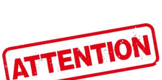 Red stamp with the word 'ATTENTION' in bold letters