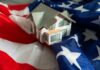 A model house placed on an American flag