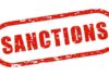 Sanctions Shocker: Trump Clears Country’s New Leader Red stamp with the word 'SANCTIONS' in bold letters