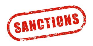 Red stamp with the word 'SANCTIONS' in bold letters