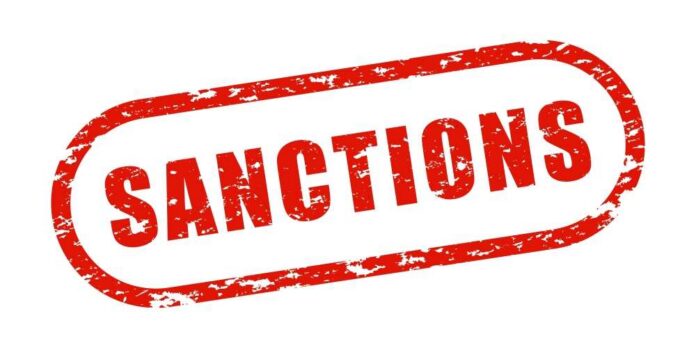 Red stamp with the word 'SANCTIONS' in bold letters