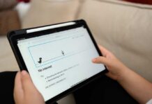 Tablet displaying a 'No internet' error message with a dinosaur game