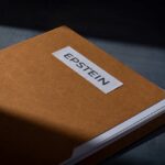 A brown folder with a label reading 'EPSTEIN'