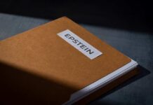 A brown folder with a label reading 'EPSTEIN'