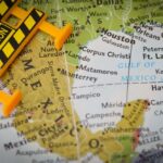 A caution sign placed on a map highlighting Mexico and the Gulf of Mexico