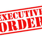 Red stamp reading executive order