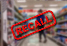Costco Recall: Dangerous Detachments! Recall stamp on blurred store aisle background.