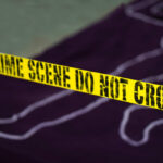 White House Gunman Killed: Why Was He There? Yellow crime scene tape marking off an area with a chalk outline